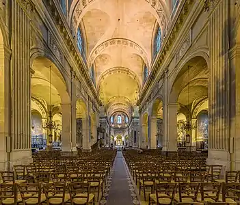 The nave. Note the absence of a "table" altar; Masses are celebrated with priest facing the altar (ad orientem).