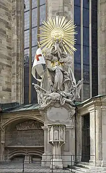 The dying, half-naked 'Turk' slips down along with his weapons. The body of the vanquished serves as a stepping stone for the transfigured Christian to ascend toward heaven. The baroque apotheosis (1738) above the Capistrano pulpit on the north side of St Stephen's Cathedral in Vienna shows John of Capistrano, canonized in 1690, as the vanquisher of the 'Turks'. Moreover, until after 1945 the inscription '1683 -schau Mahomet, du Hunt' (1683 -Look Muhammad, You Dog) hung resplendent above the main entrance of the cathedral. It was only removed by order of Cardinal Franz König.