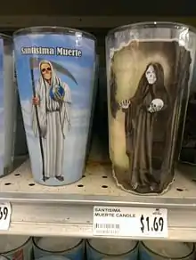 Votive candles for Santa Muerte, a Saint in Folk Catholicism.