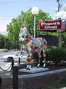 Life-sized fiberglass horse, decorated with multicolored ice-cream cones