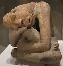 Terracotta seated figure; 13th century; earthenware; 29.9 cm (113⁄4 in.) high; Metropolitan Museum of Art (New York City, USA) The raised marks and indentations on the back of this hunched Djenné figure may represent disease or, more likely, sacrification patterns. The facial expression and pose could depict an individual in mouring or in pain