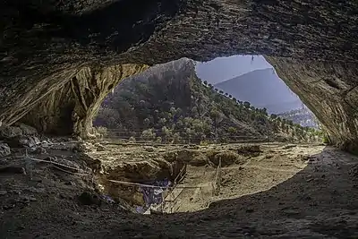 Image 19Inside the Shanidar Cave where the remains of eight adults and two infant Neanderthals, dating from around 65,000–35,000 years ago were found. (from History of Iraq)