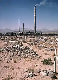 Smeltertown cemetery with ASARCO smelter chimneys in the background, still operating, in 1972.