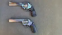 Two revolvers are shown. The first is a Umarex air soft 629, the second is a real Smith & Wesson model 629.