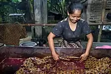 Dyeing the cloth in colour