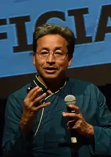 Sonam Wangchuk wearing 'Goucha',traditional robe of Ladakh and delivering a speech in 2017.