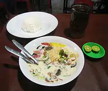 Soto betawi, a Betawi beef meat and offals in rich and creamy milk or coconut milk soup.