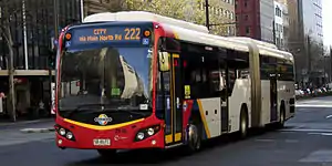 SouthLink Custom Coaches bodied Scania K320UA on King William Street in September 2014