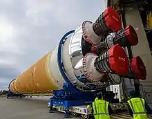 The Space Launch System Core Stage rolling out of the Michoud Facility for shipping to Stennis