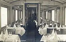 restaurant carriage, with tables set for dinner