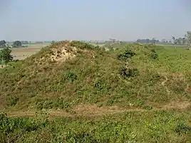 City walls of Shravasti, with the ancient city gate.