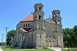 St. Mary's Church in Beaverville. This structure in particular was designed in the Romanesque Revival style.