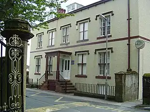 Rectangular hood mouldings on a rendered Victorian building (in Cumbria, England).