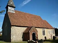 St Leonard's Church – porch, west wall and modern wooden bellcote