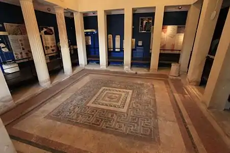 16-column peristyle atrium of the Domvs Romana, in Malta (1st century BC). Note puteal and overflow hole of impluvium.