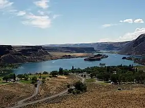 High point view of a body of water surrounded by steep cliffs