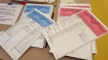 Republican and Democratic party ballots in a Massachusetts polling location, 2016