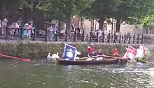 Royal (white flag, far right) and the Vintners' (red flag) and Dyers' (blue flag) Swan Uppers at Abingdon in 2006