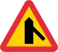 Skewed side road priority on right