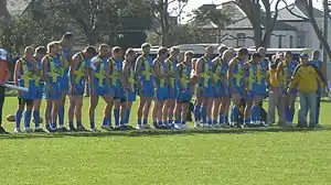 Swedish team lines up for the national anthem before taking on Canada