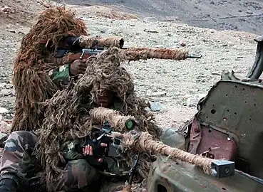 Snipers of the 2e REI with PGM Hécate II and FR F2 sniper rifles in Afghanistan, 2005.