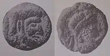 Weathered two-sided coin