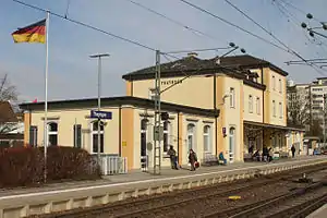 Three-story building with hipped roof