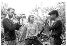 Matt Devries (left) and Jen Schradie interview a villager in Hacienda Looc.