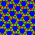 Snub trihexagonal tiling (ignoring the colors: p6); the translation vectors are rotated a little to the right compared with the directions in the underlying hexagonal lattice of the image