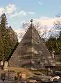 A "pyramidal tomb".