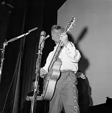 Image 15Tommy Steele, one of the first British rock and rollers, performing in Stockholm in 1957 (from Rock and roll)