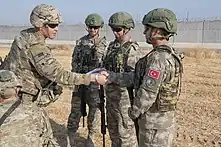 U.S. and Turkish military forces conduct the third ground combined joint patrol inside the security mechanism area in northeast Syria.