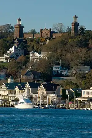 The eastern shore of Highlands borough, topped on a bluff by the Twin Lights of the Navesink