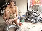 Two-wheeler puncture repairer in Saligao.