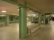 Station with pillars painted green