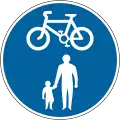 Road shared by cyclists and pedestrians.