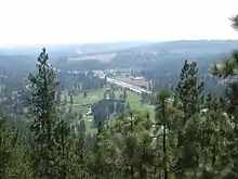 US 195 traveling along Hangman Creek in Spokane, viewed from the east