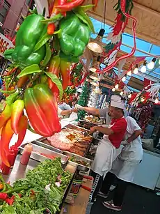 Image 19Street vendors at the Feast of San Gennaro in Manhattan's Little Italy (from Culture of New York City)