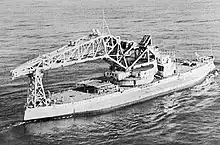 Kearsarge with a large crane on her deck