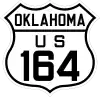 A U.S. route shield in the 1926 style, reading "OKLAHOMA / US / 164".