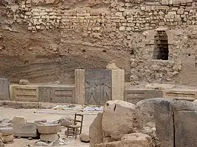 Temple of Hadad within the Citadel of Aleppo with an engraving of two men wearing ornate forms of the labbadeh