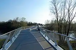 Pedestrian bridge with sitting areas