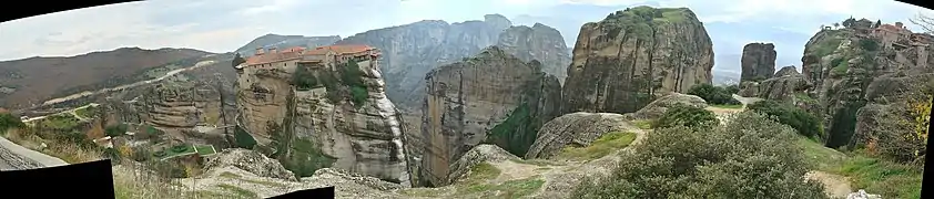 Panoramic view at monasteries of Varlaam and Grand Meteoron. From left to right: Kelarakia, Varlaam Monastery, Holy Monastery, Ypsilotera, Devil's Tower, and Grand Meteoron.