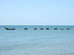 Being towed to the fishing ground.