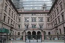 The Villard Houses, surrounding the courtyard in the center, as seen from across the street in early 2021