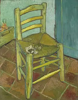 A single, simple, yellow, wooden and straw, armless, empty chair, with a pipe and tobacco on the seat, in an empty room with tiles on the floor.