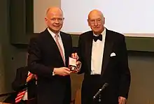 The 2nd Viscount (right), receiving the Canning Medal from William Hague in 2013