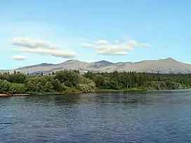 View of the Tulymsky Kamen mountain range from the banks of the Vishera