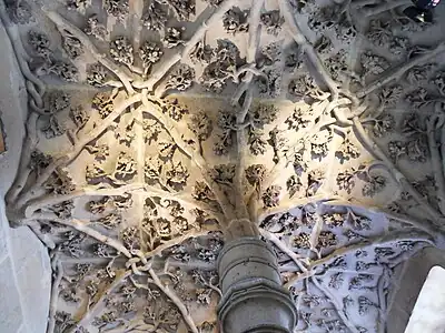 The sculpture at the top of the main stairway, with the intertwined emblems of the family of Jean sans Peur