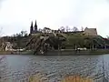 Vyšehrad fortress contains Basilica of St Peter and St Paul, the Vyšehrad Cemetery and the oldest Rotunda of St. Martin.